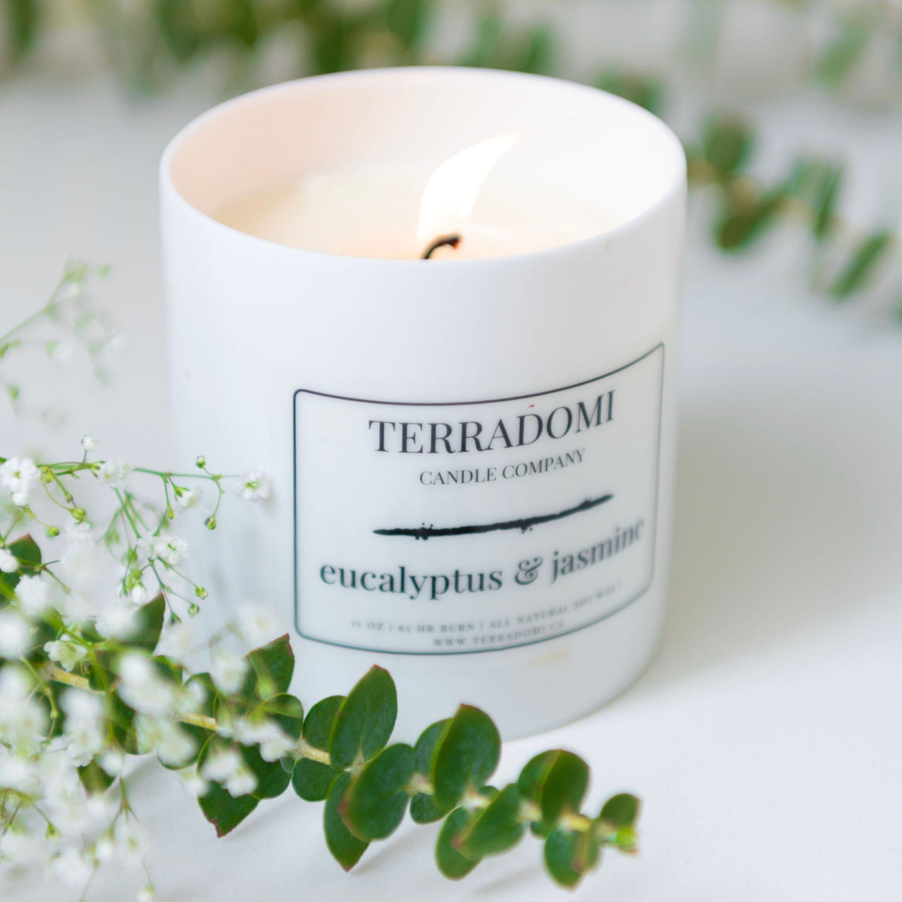 Burning eucalyptus and jasmine candle